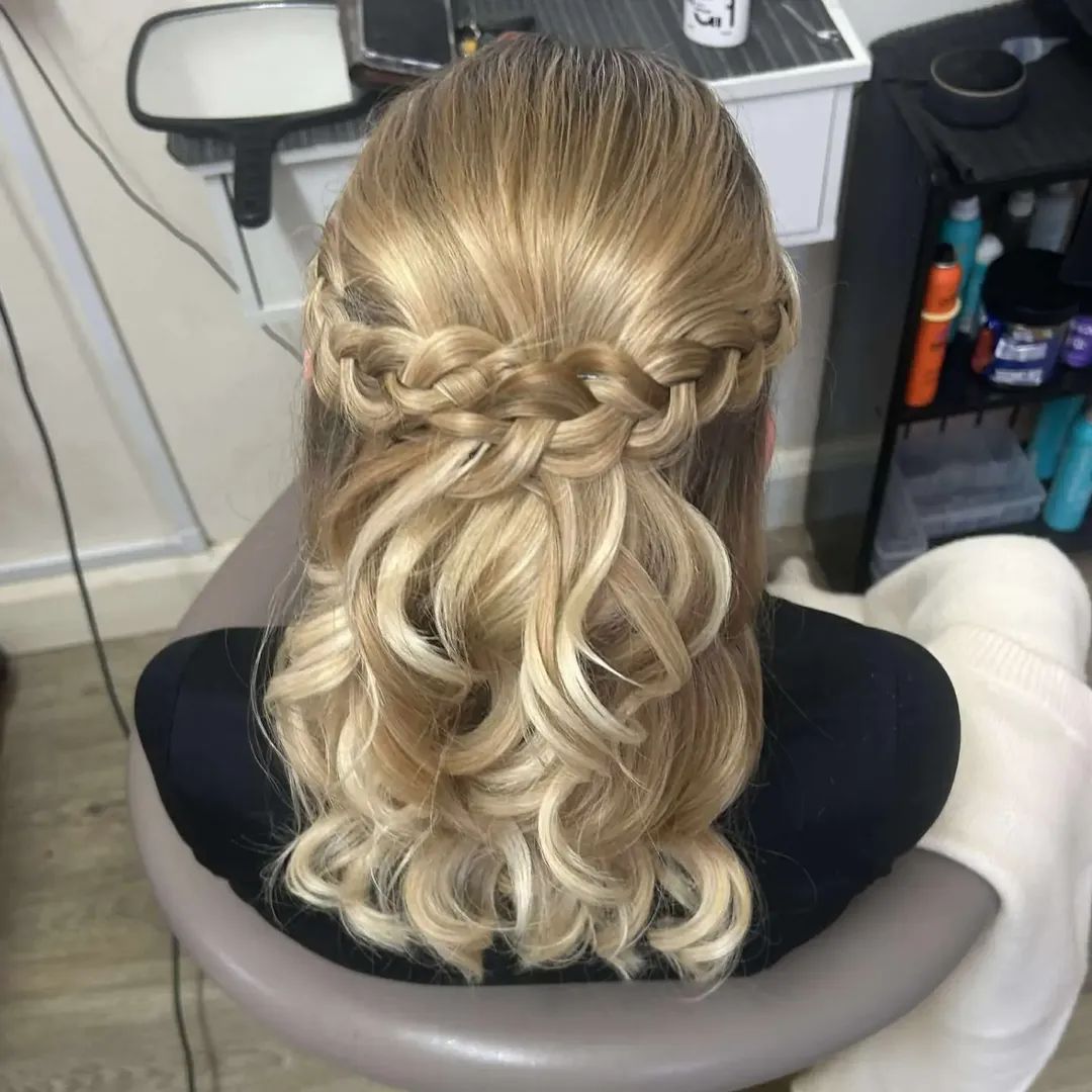Braided half-up style with soft curls